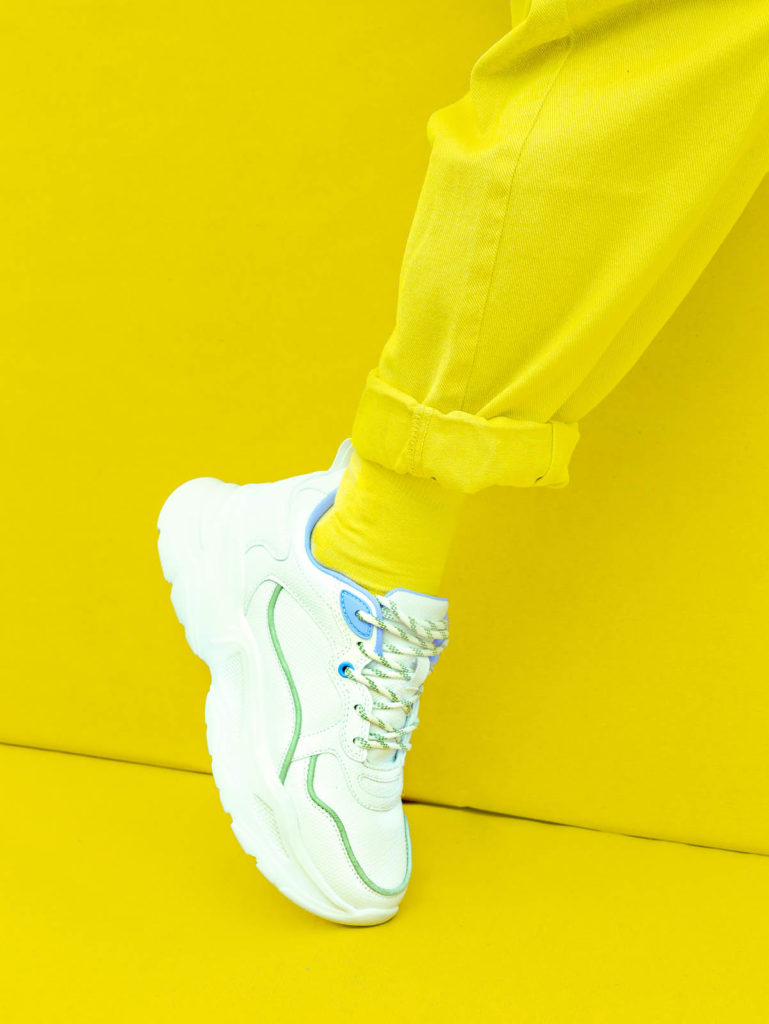Fashion Sneakers. Minimal monochrome design.  Yellow aesthetic