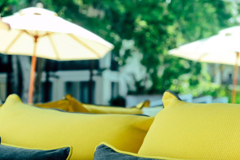 yellow-fabric-sofa-and-cushions-decorate-in-tropic-2021-09-03-06-23-11-utc
